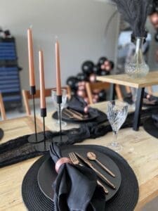 black and rose gold table setting