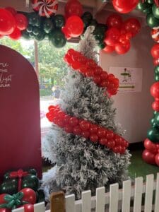 Christmas Tree with balloon garland decorations